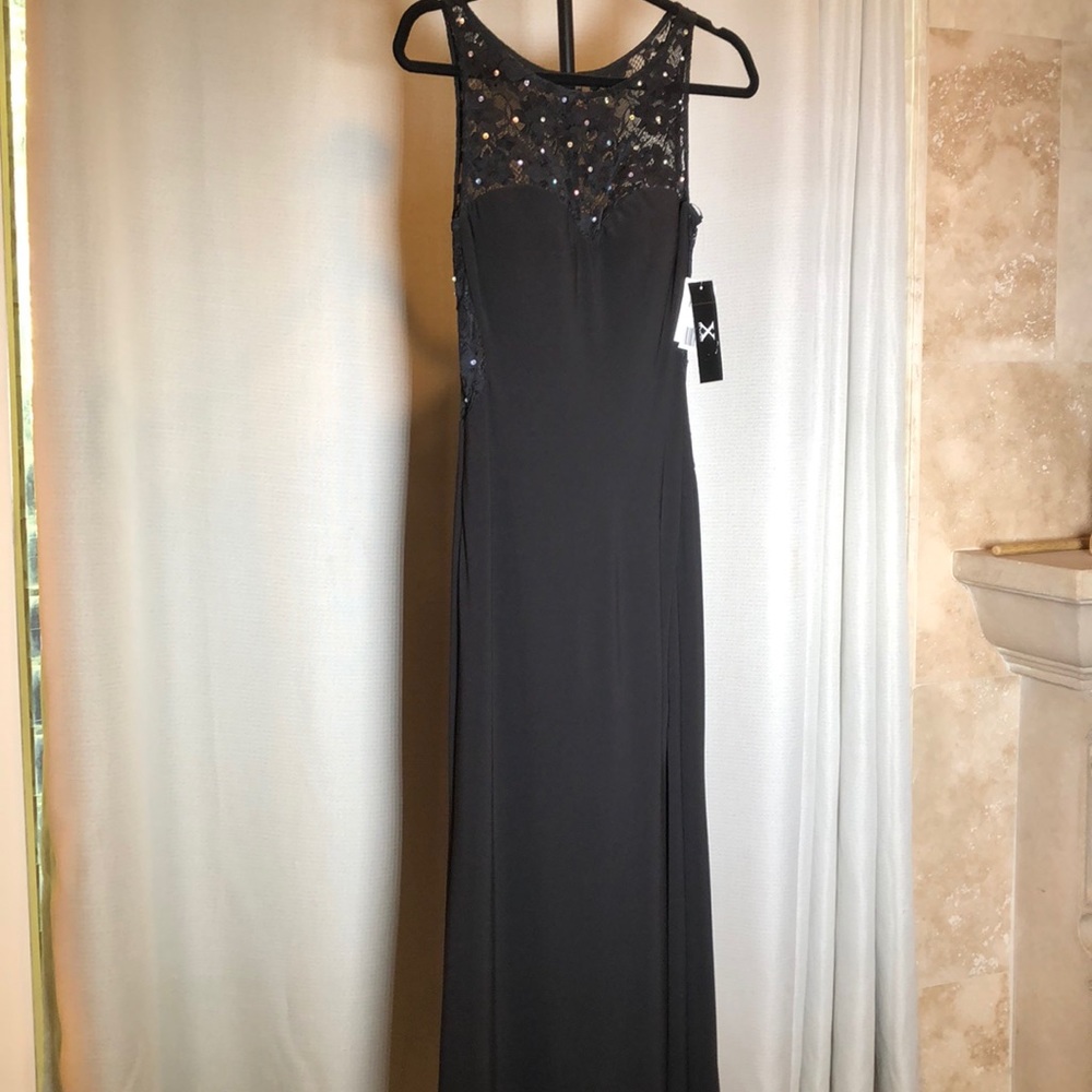 X By Xscape Black Gown Size 4. Simply Classy and comfortable.